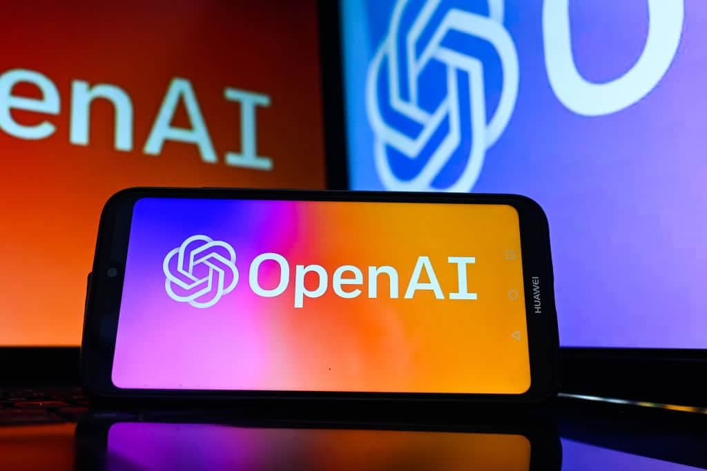 In this photo illustration a Open AI logo is displayed on a