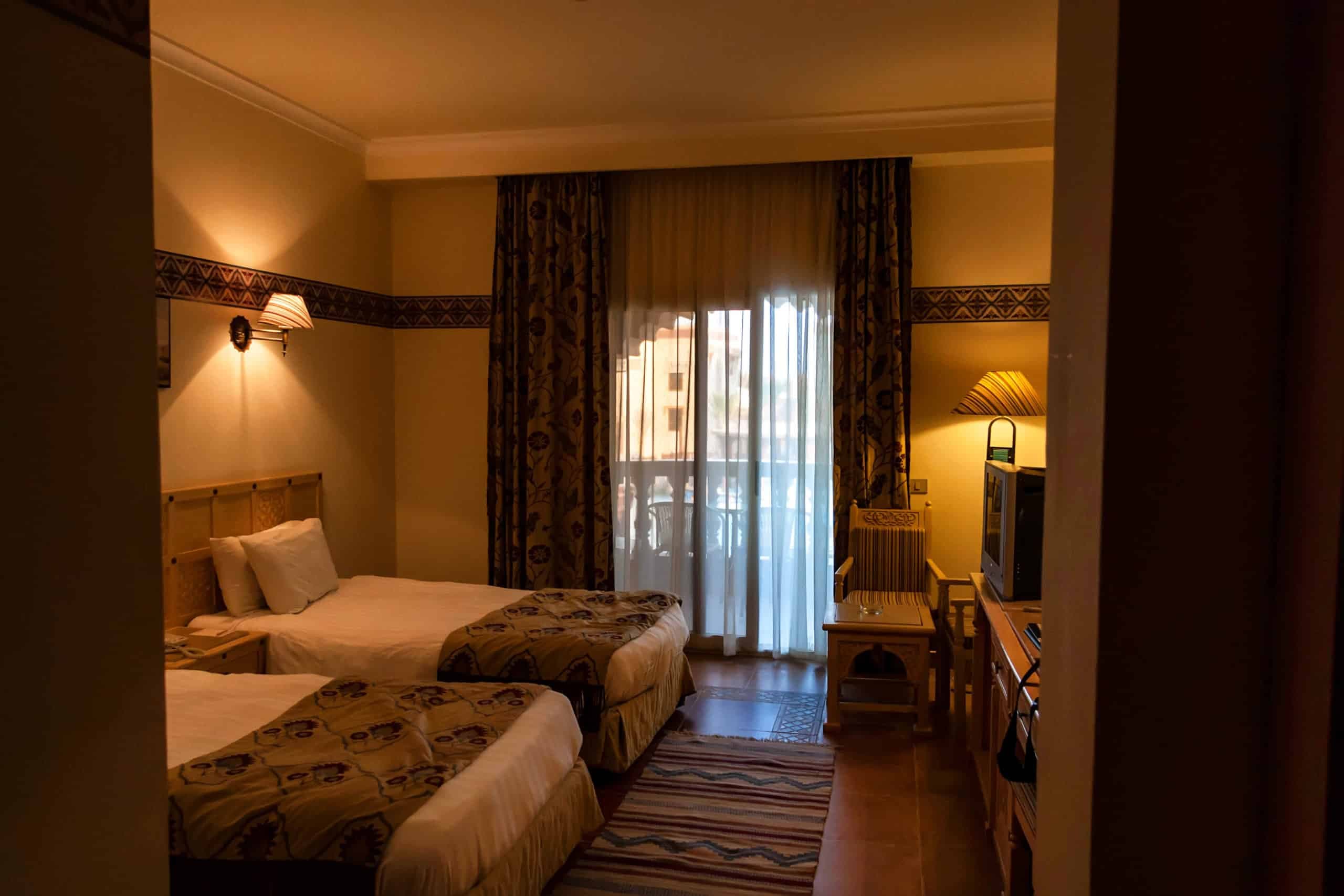Interior of hotel room with twin beds